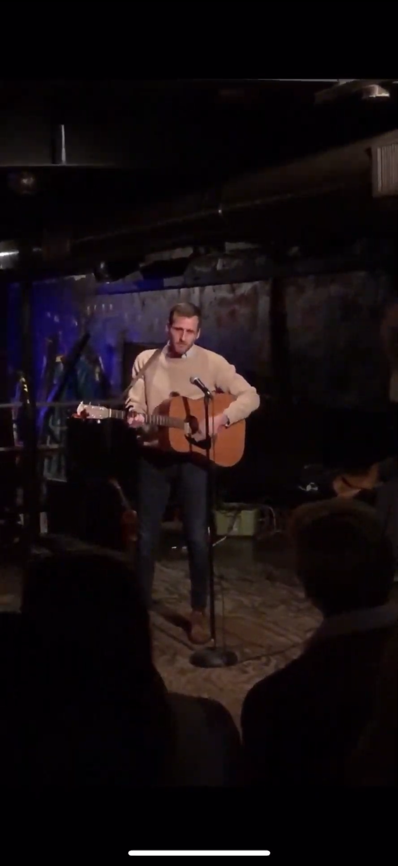 Randy Bryan Moore performing live with acoustic guitar